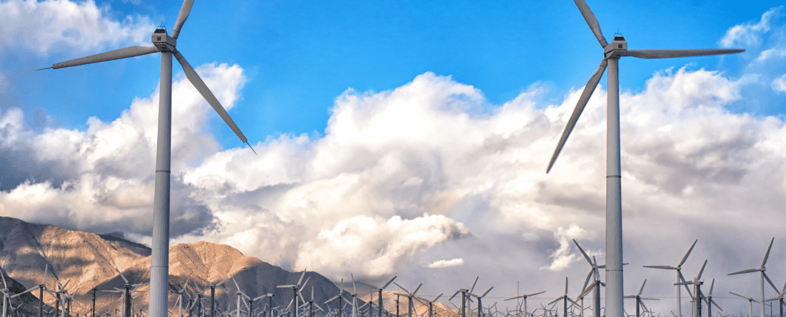 picture of wind power mills and mountains